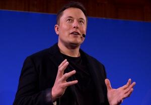 特斯拉CEO：人类与AI共生可破解“机器人威胁”