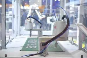 分拣机器人、自动贴标及料箱拣选系统