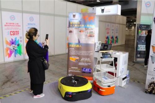 木蚁亮相“上交会” 让物流机器人不仅有“腿”还有“手”和“大脑”