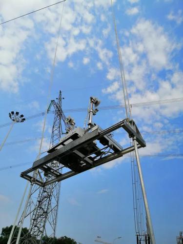高空线路机器人移动式自动上下线装置填补世界空白